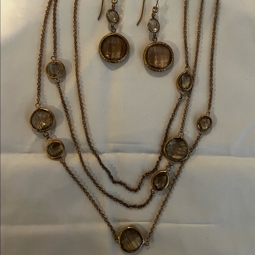Gold tone 3 chain layered necklace with gold speckled stones